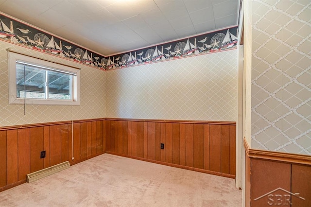 empty room featuring light colored carpet