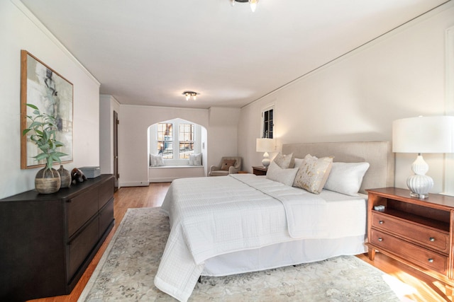 bedroom with light hardwood / wood-style floors