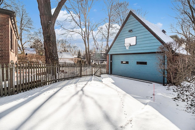 exterior space featuring an outbuilding and a garage