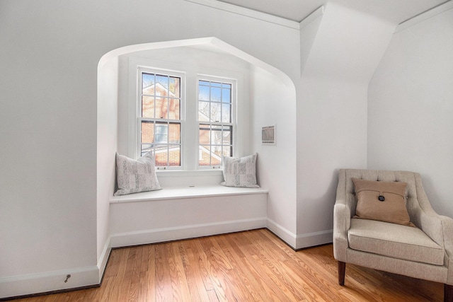 sitting room with light hardwood / wood-style floors