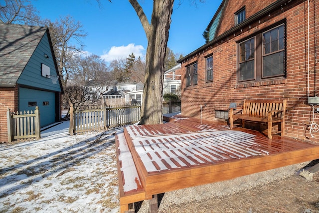 view of snow covered deck