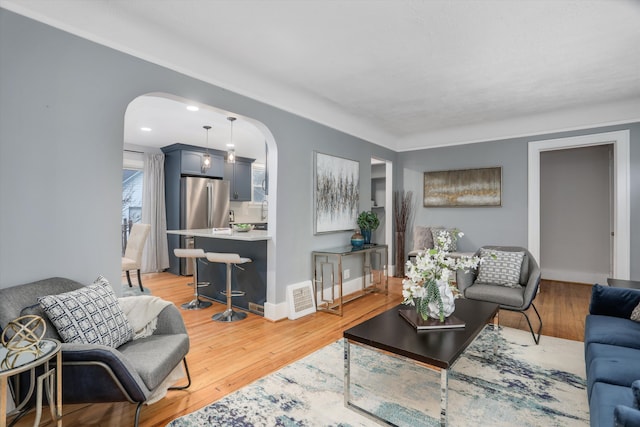 living room with light hardwood / wood-style floors