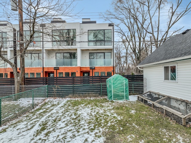 view of snow covered property