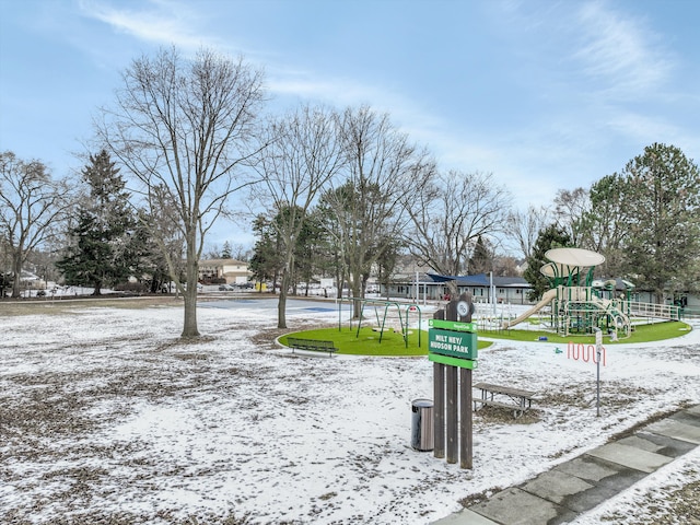 view of property's community featuring a playground