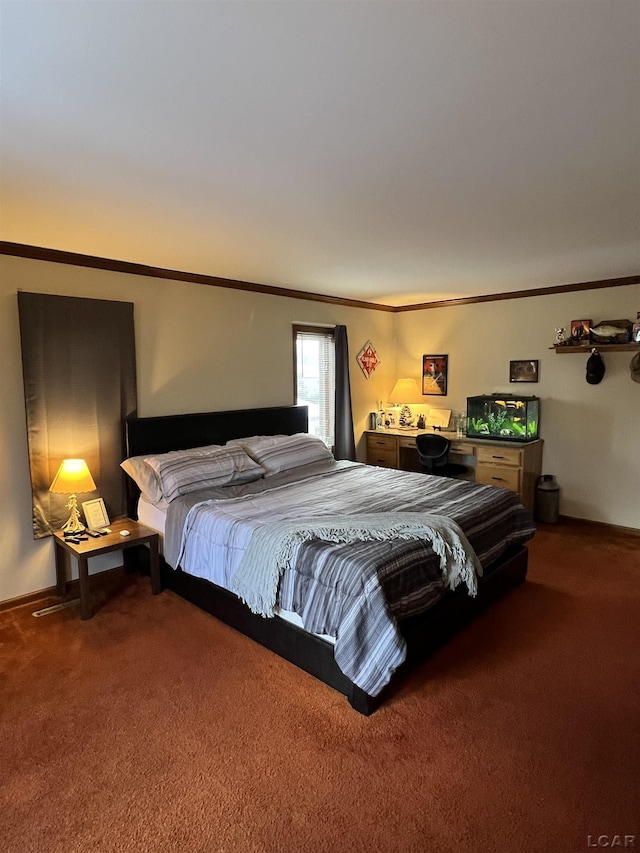 bedroom with ornamental molding and carpet floors