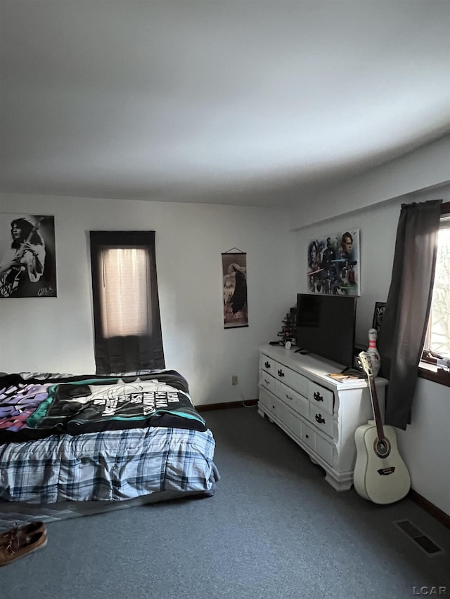 bedroom featuring carpet