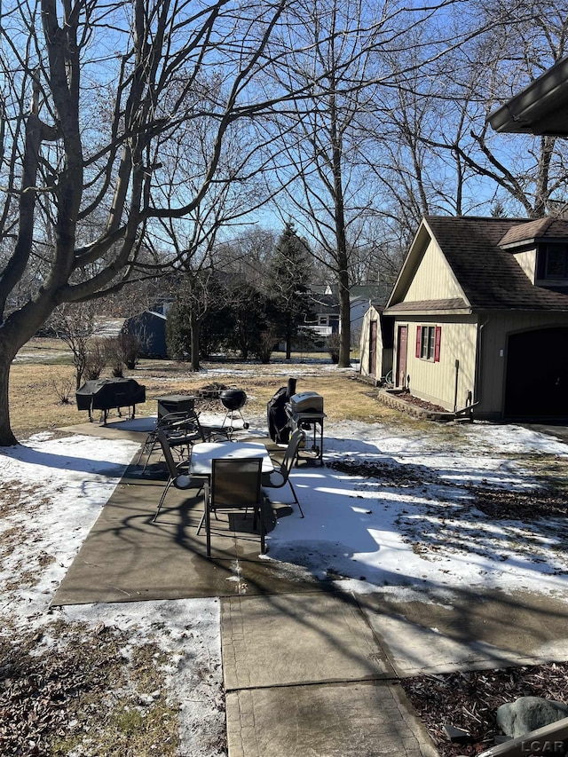 view of snow covered patio