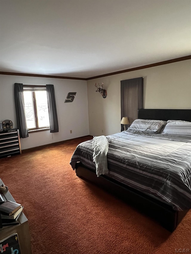 carpeted bedroom featuring crown molding