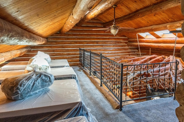 interior space featuring carpet and a skylight