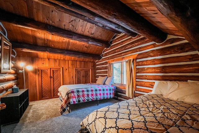 carpeted bedroom with lofted ceiling with beams and wooden ceiling