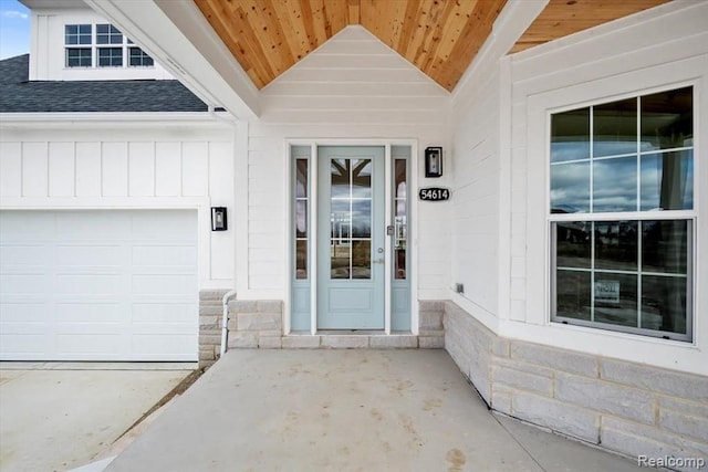 entrance to property featuring a garage