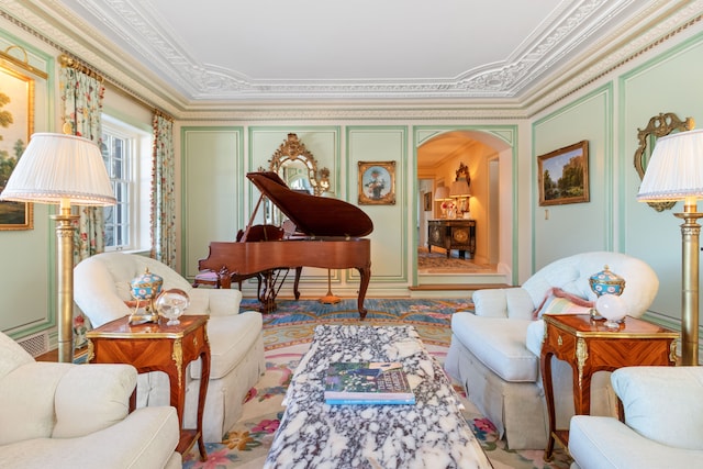 sitting room with ornamental molding