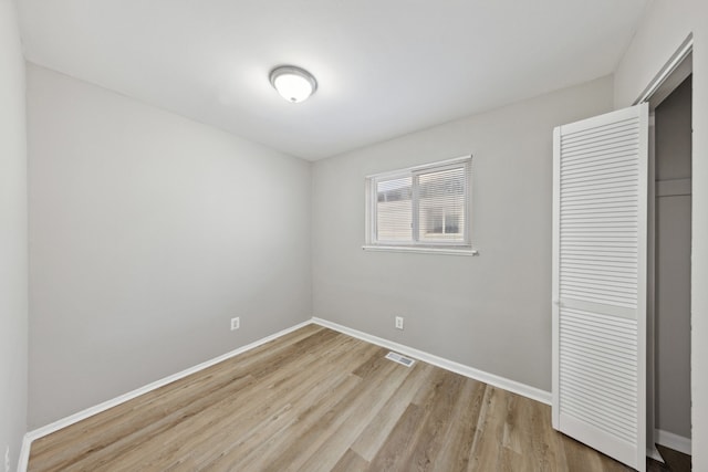 unfurnished bedroom with light hardwood / wood-style floors