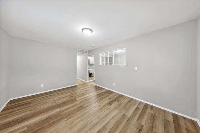 empty room featuring light hardwood / wood-style floors