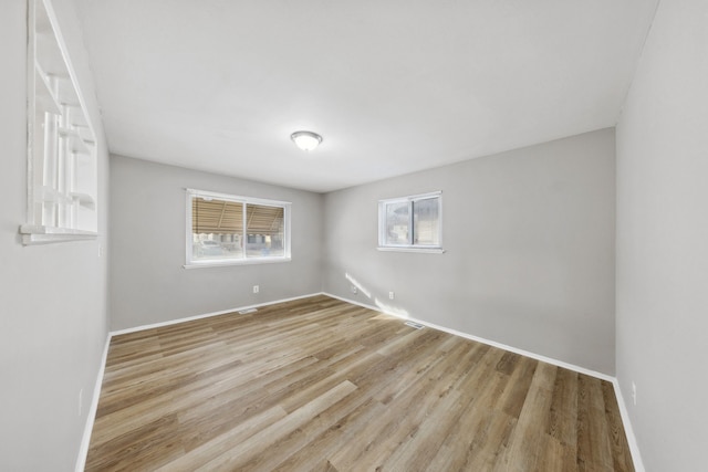 empty room featuring light hardwood / wood-style flooring