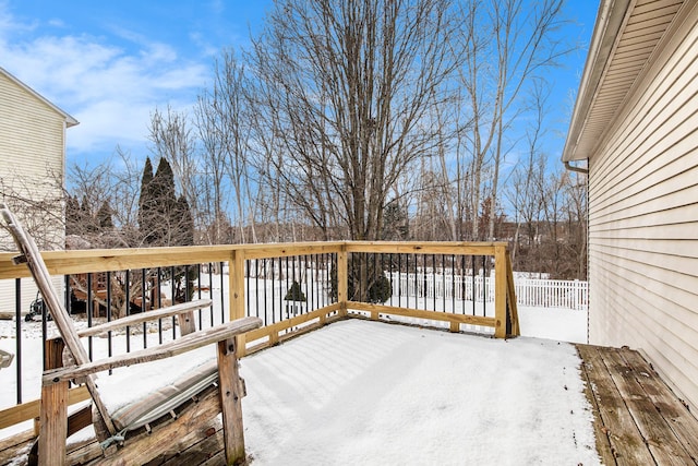 view of snow covered deck