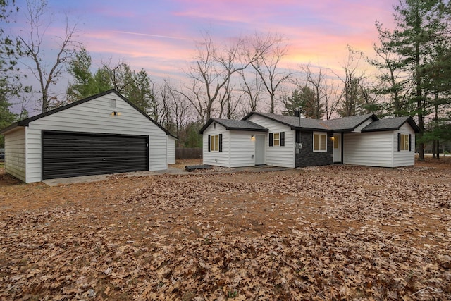 ranch-style home with a garage