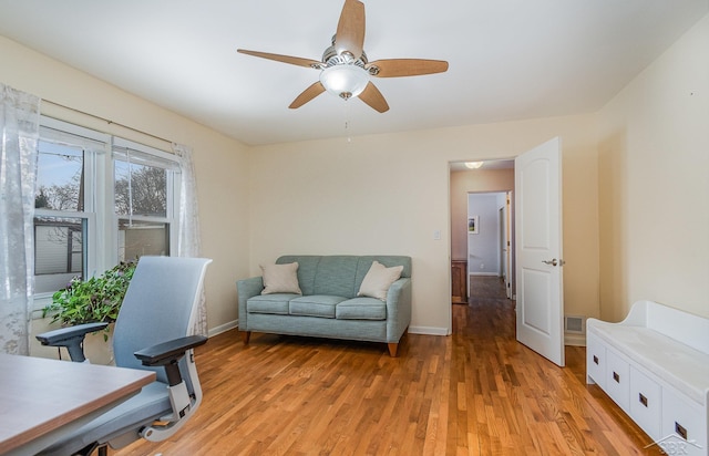 office area with light hardwood / wood-style flooring