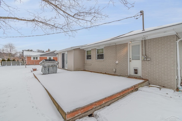 view of snow covered property