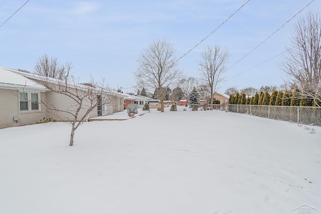 view of snowy yard