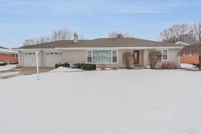 single story home with a garage