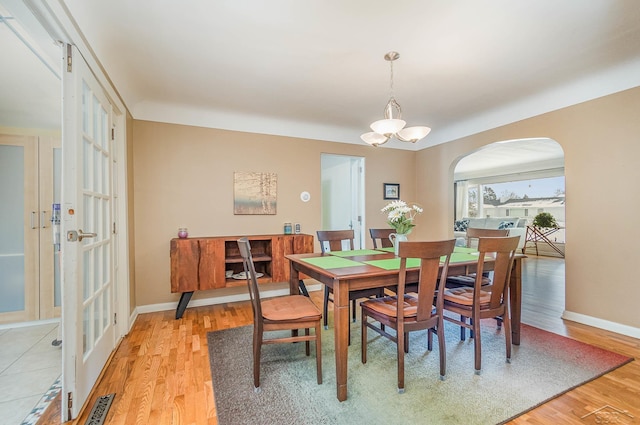 dining area with light hardwood / wood-style floors