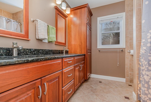 bathroom with vanity and a shower with shower curtain