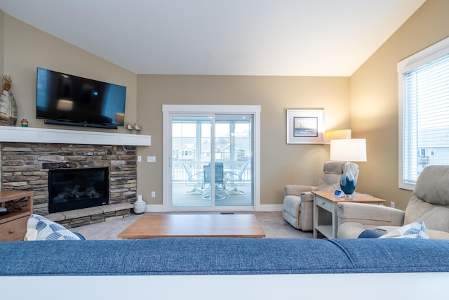 3774 Bungalow Path Unit 32, Saint Joseph, MI 49085 - living room featuring light carpet and a fireplace
