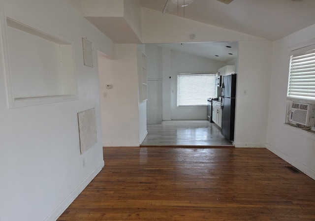 30052 Schoenherr Rd, Warren, MI 48088 - hallway with lofted ceiling, wood finished floors, cooling unit, and baseboards