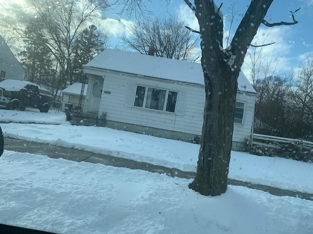 view of snow covered property