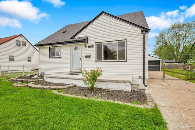 23225 Beverly St, Saint Clair Shores, MI 48082 - rear view of property with roof with shingles and concrete driveway