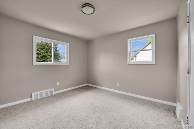 23225 Beverly St, Saint Clair Shores, MI 48082 - carpeted spare room featuring baseboards