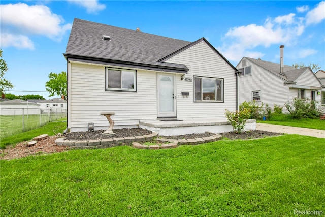23225 Beverly St, Saint Clair Shores, MI 48082 - view of front of house featuring a shingled roof