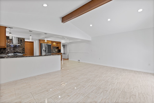 unfurnished living room with vaulted ceiling with beams