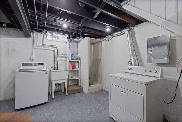 laundry room with washing machine and dryer