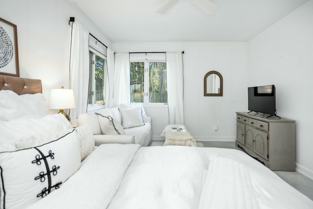 19300 Highland Dr, New Buffalo, MI 49117 - bedroom with baseboards and ceiling fan