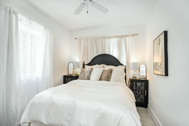 19300 Highland Dr, New Buffalo, MI 49117 - bedroom featuring baseboards and ceiling fan