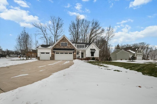 view of front of house with a garage and board and batten siding