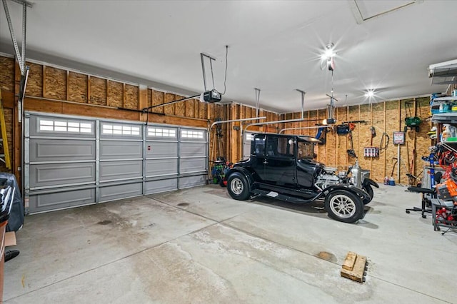 garage featuring a garage door opener