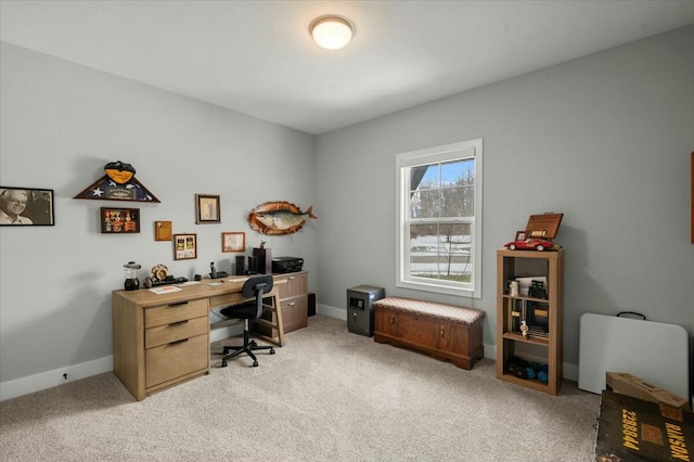 office area with light carpet and baseboards