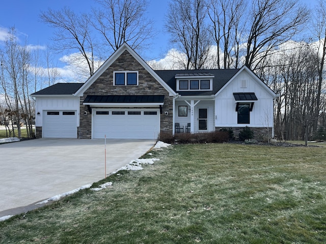 view of front facade with board and batten siding, stone siding, and a standing seam roof