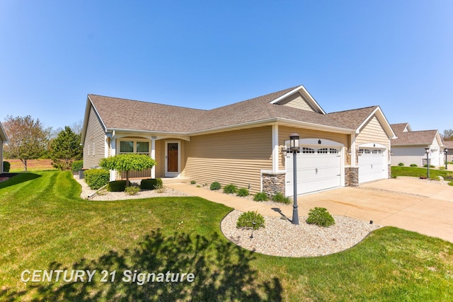 100 Tuscany Cir, Saginaw, MI 48603 - view of front of house featuring a garage, a front lawn, driveway, and roof with shingles