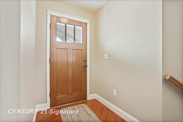 100 Tuscany Cir, Saginaw, MI 48603 - entryway featuring baseboards and wood finished floors