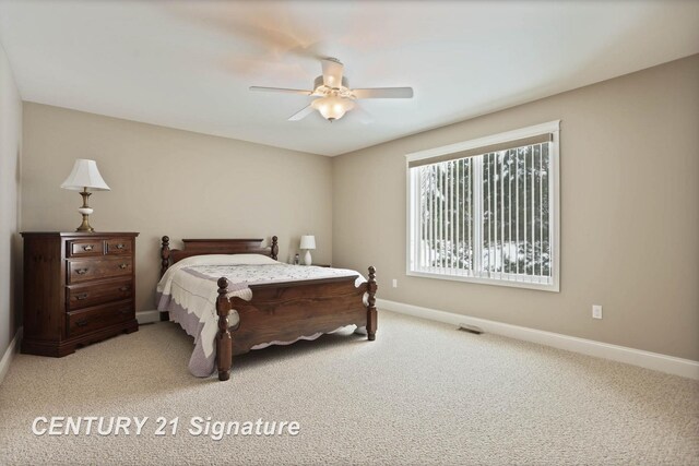 100 Tuscany Cir, Saginaw, MI 48603 - carpeted bedroom with baseboards and ceiling fan