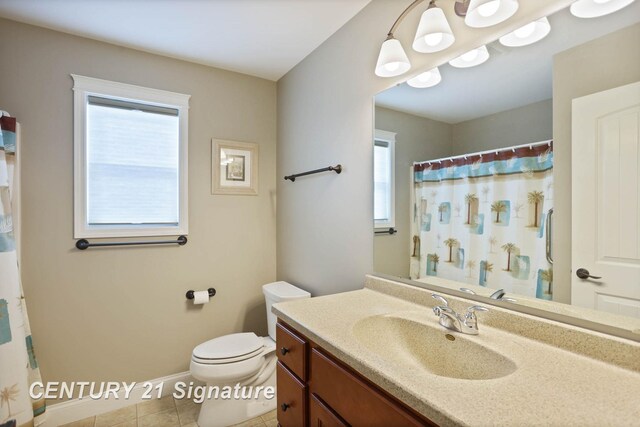 100 Tuscany Cir, Saginaw, MI 48603 - bathroom featuring plenty of natural light, toilet, vanity, and tile patterned floors