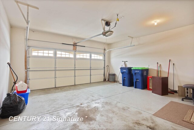 100 Tuscany Cir, Saginaw, MI 48603 - garage with a garage door opener