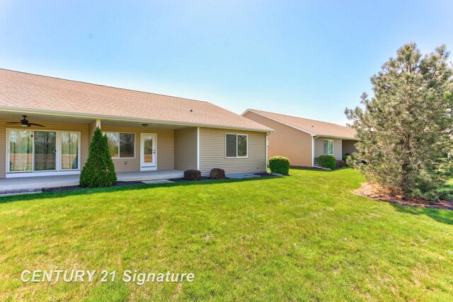 100 Tuscany Cir, Saginaw, MI 48603 - rear view of property featuring a ceiling fan, a yard, and a patio