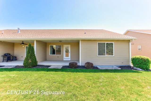 100 Tuscany Cir, Saginaw, MI 48603 - rear view of property with ceiling fan and a yard