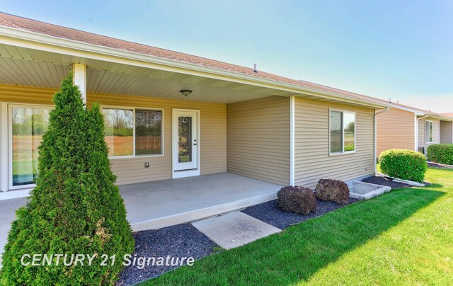 100 Tuscany Cir, Saginaw, MI 48603 - property entrance featuring a lawn