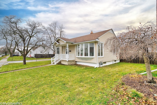 view of front of home featuring a front lawn